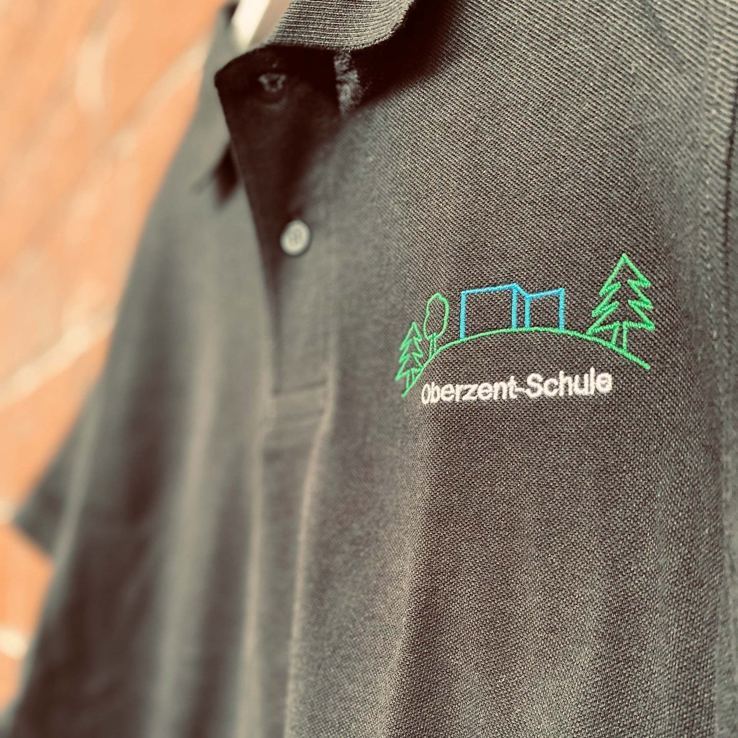 Poloshirt mit Logo der Oberzent-Schule